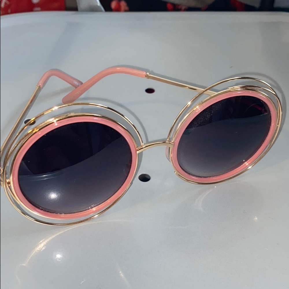 oversized pink and gold sunglasses